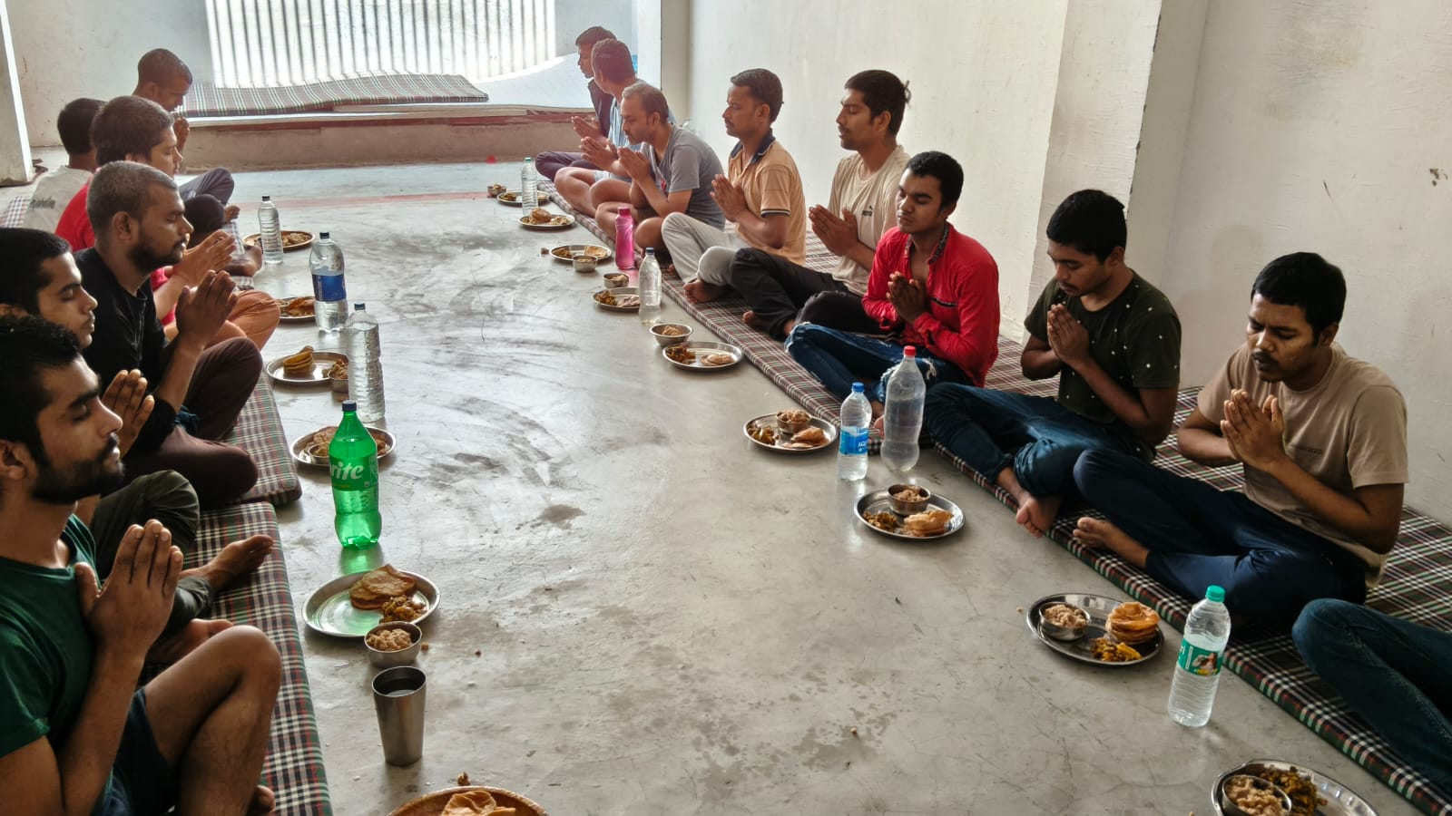 Residents seated together for a shared meal at the centre